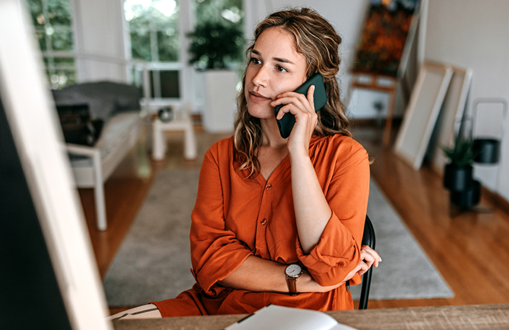sitting down while on the phone